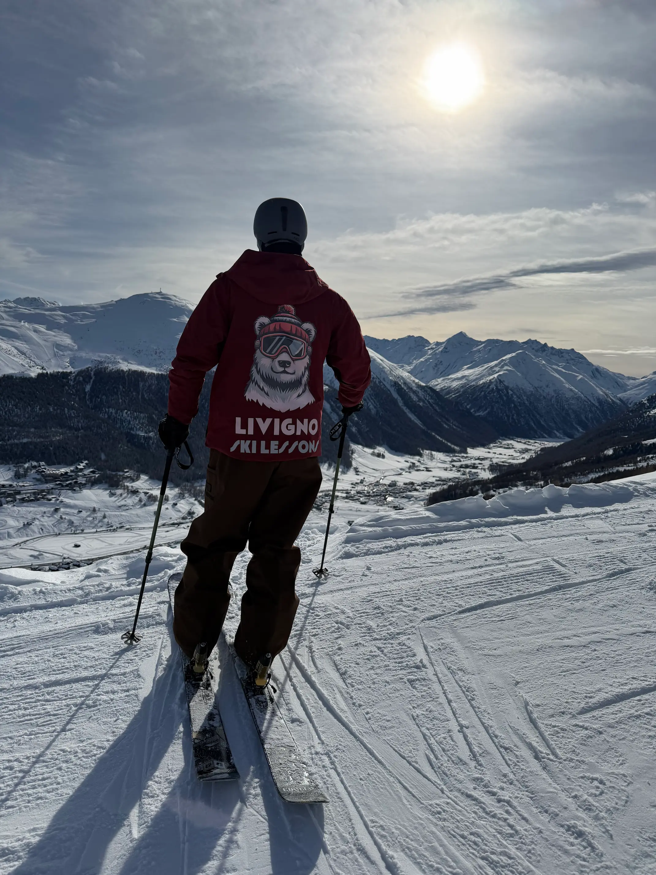Children skiing on the slopes of Livigno in small group with instructor